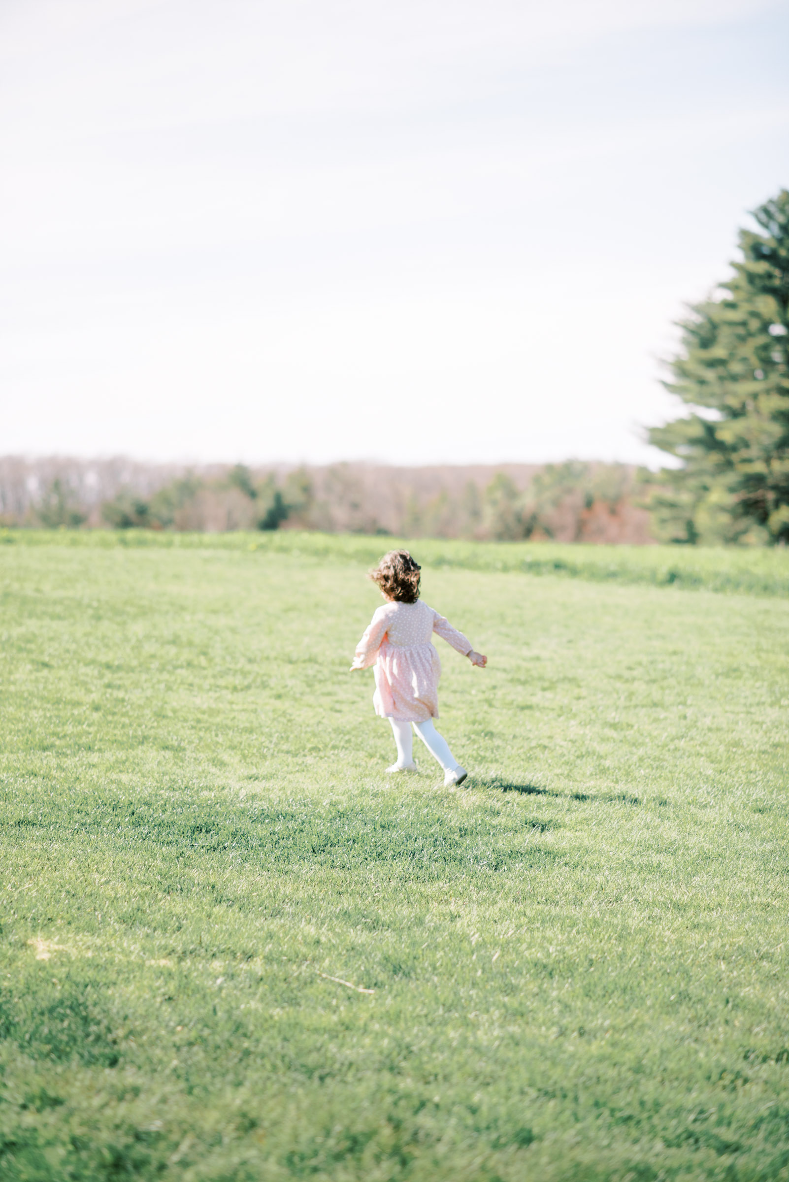daughter running in field