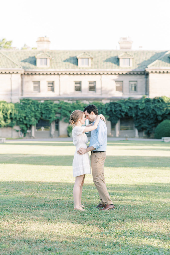 couple in front of Eolia Mansion at Harkness Memorial Engagement Session