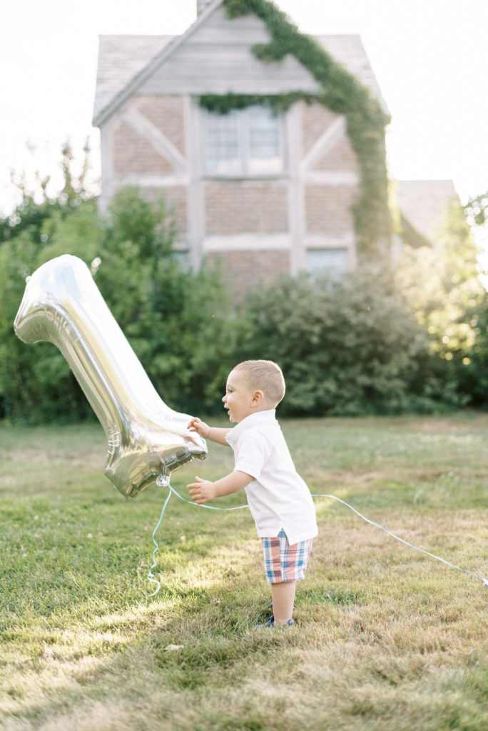 child with one balloon