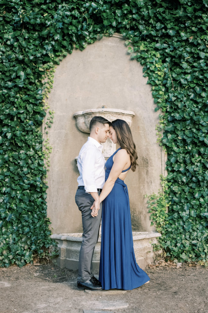 Harkness Memorial Engagement Session ivy arch forehead to forehead
