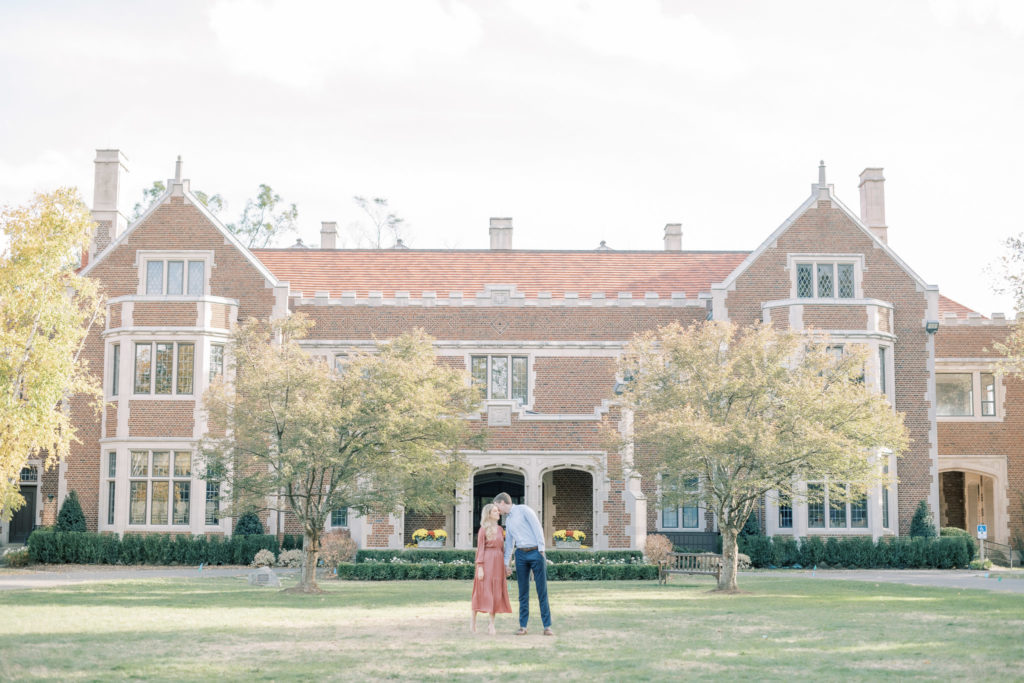 couple standing in front of building