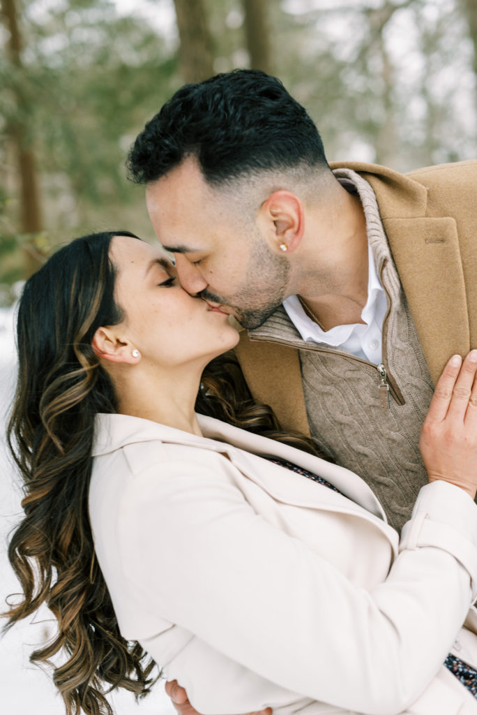 romantic kiss at edgerton park engagement session