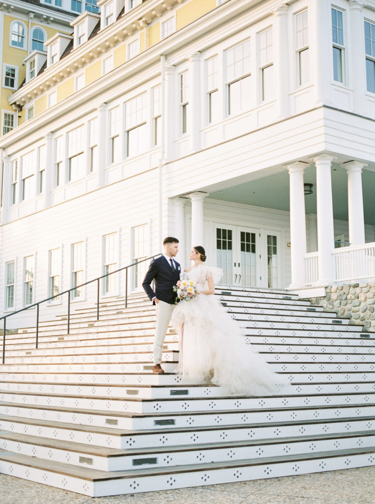 ocean house wedding on stairs