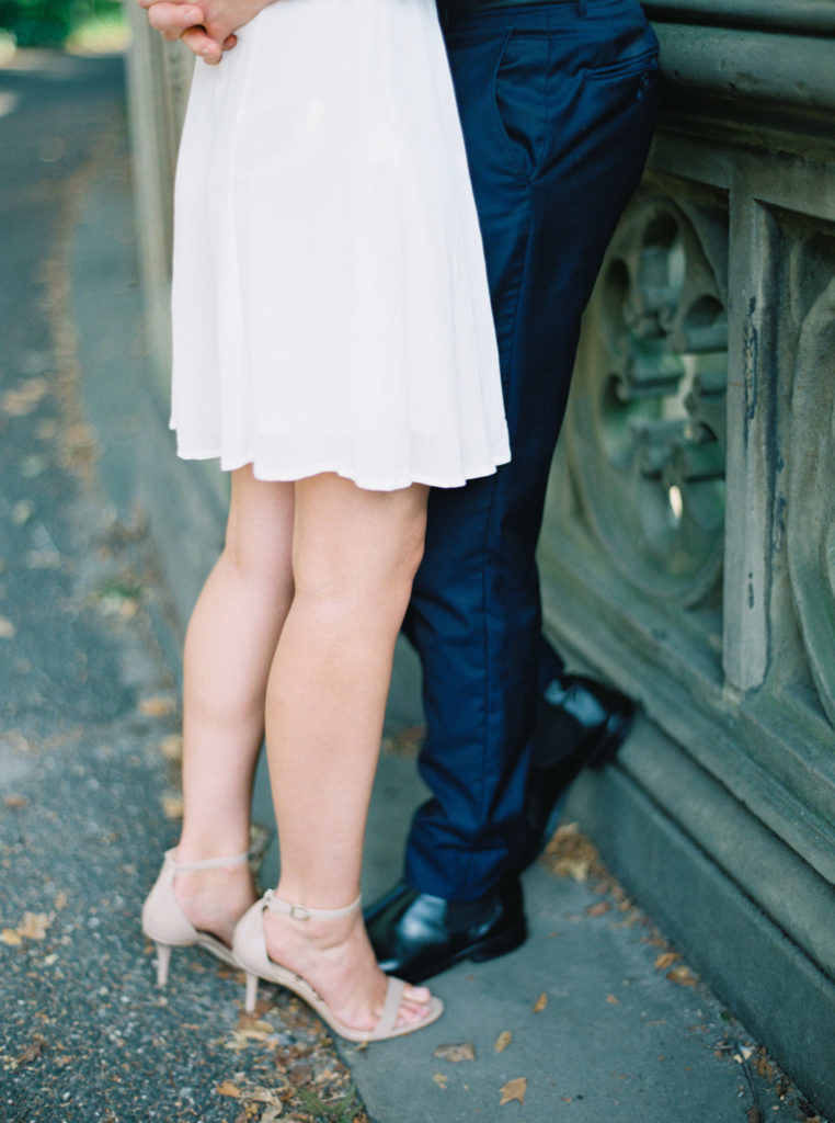 close up of legs at bethesda terrace engagement session