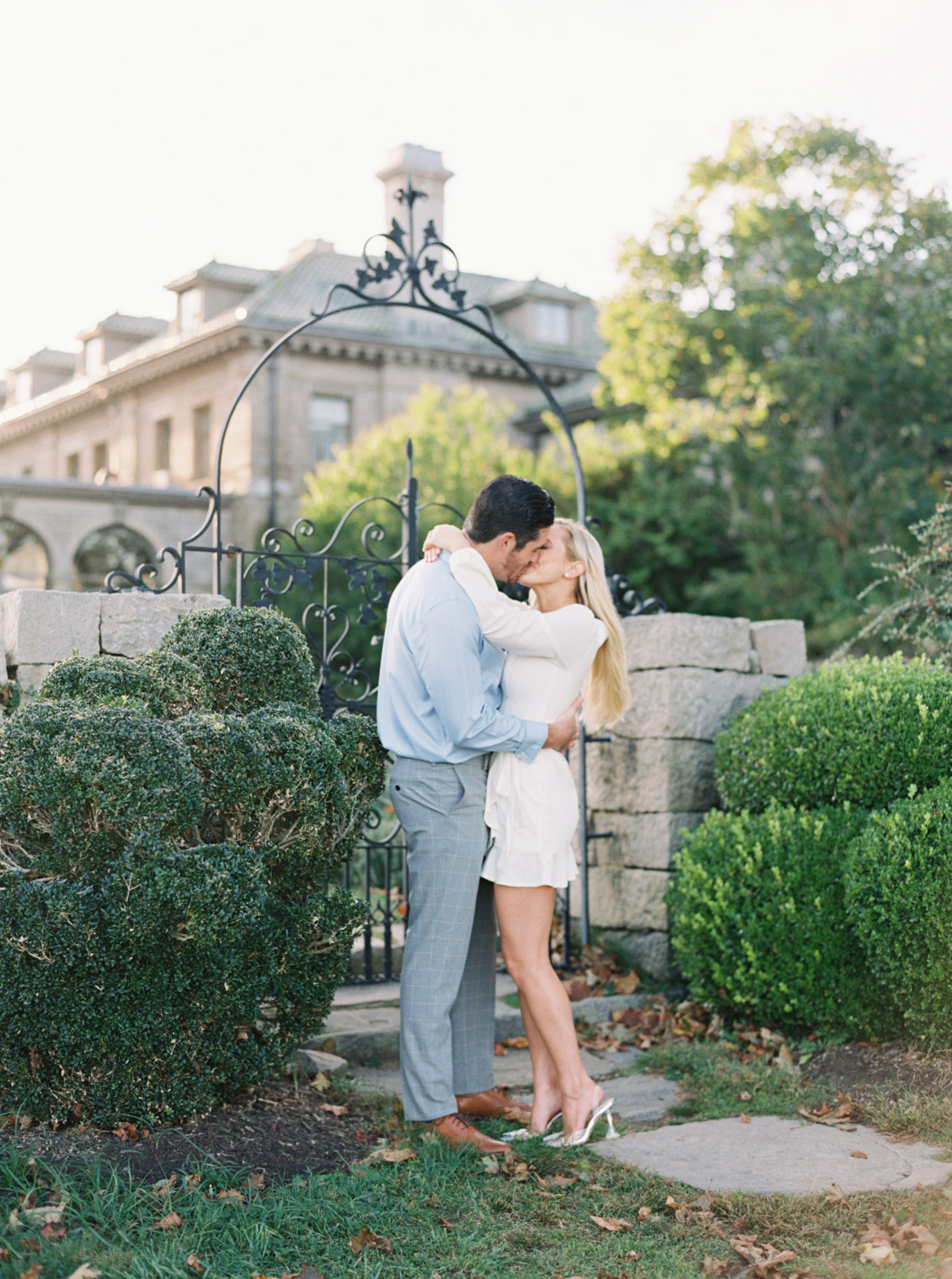 at the gate at Harkness Memorial engagement session