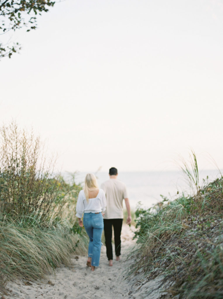 off to the beach at Harkness Memorial engagement session