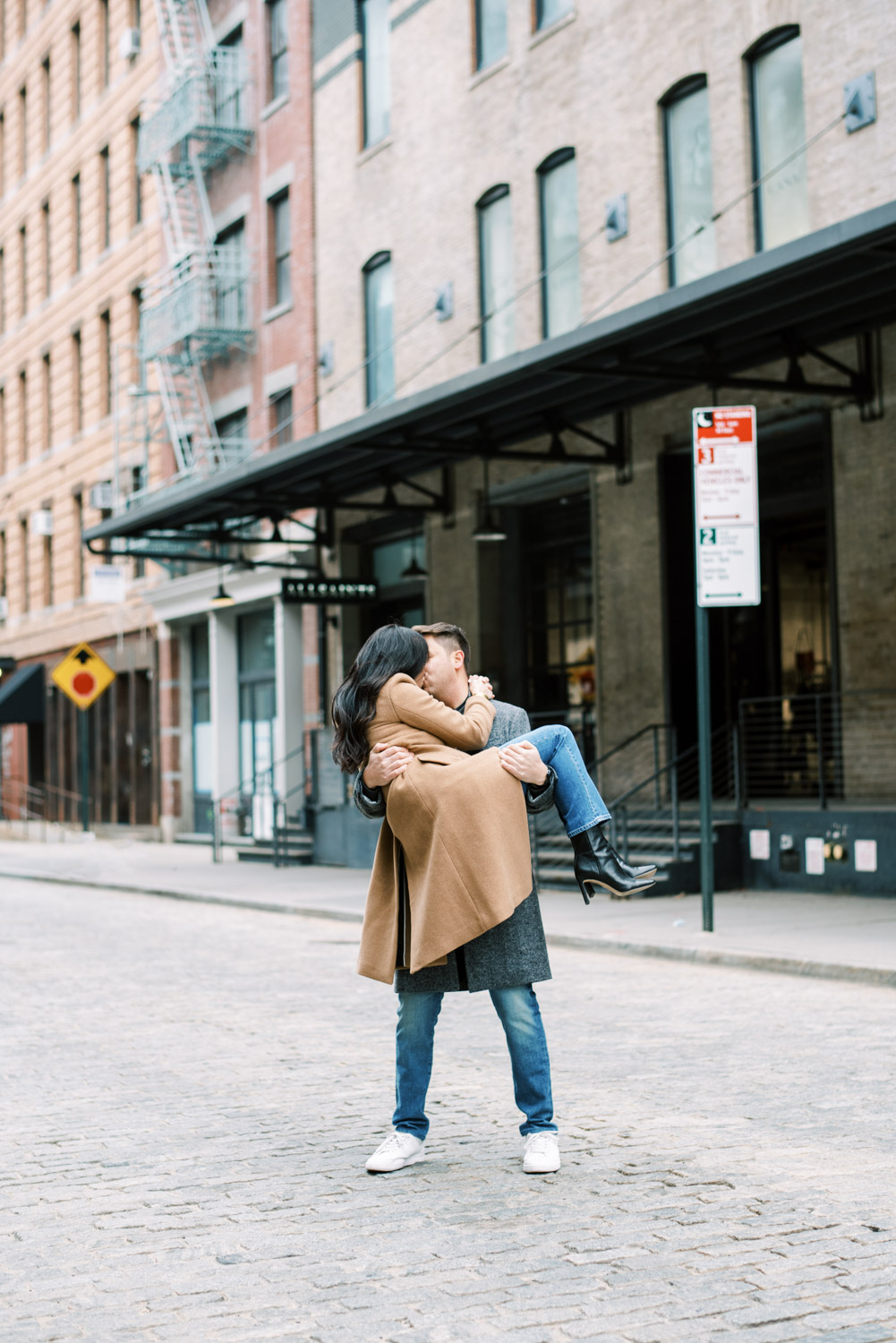 Meatpacking Engagement Session lift and kiss