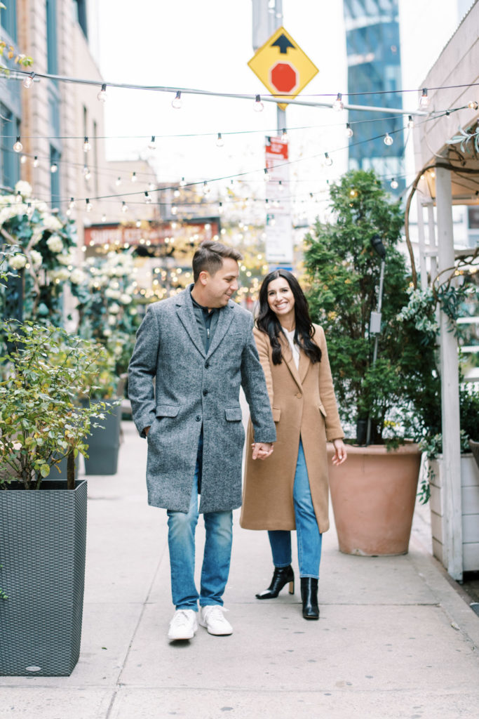 Meatpacking Engagement Session walking with lights