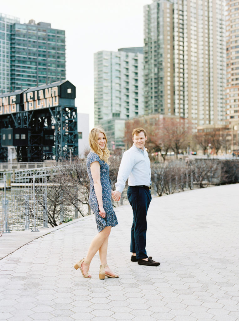 walking together at long island city engagement session