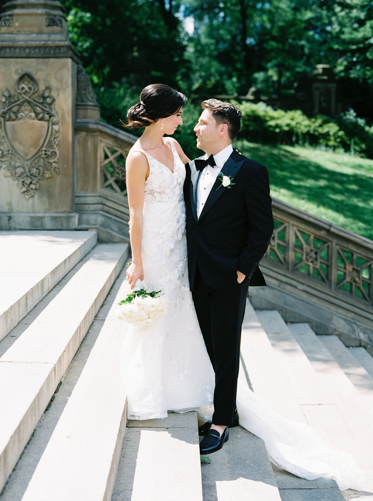 bride and groom on the steps of Bethesda Terrace