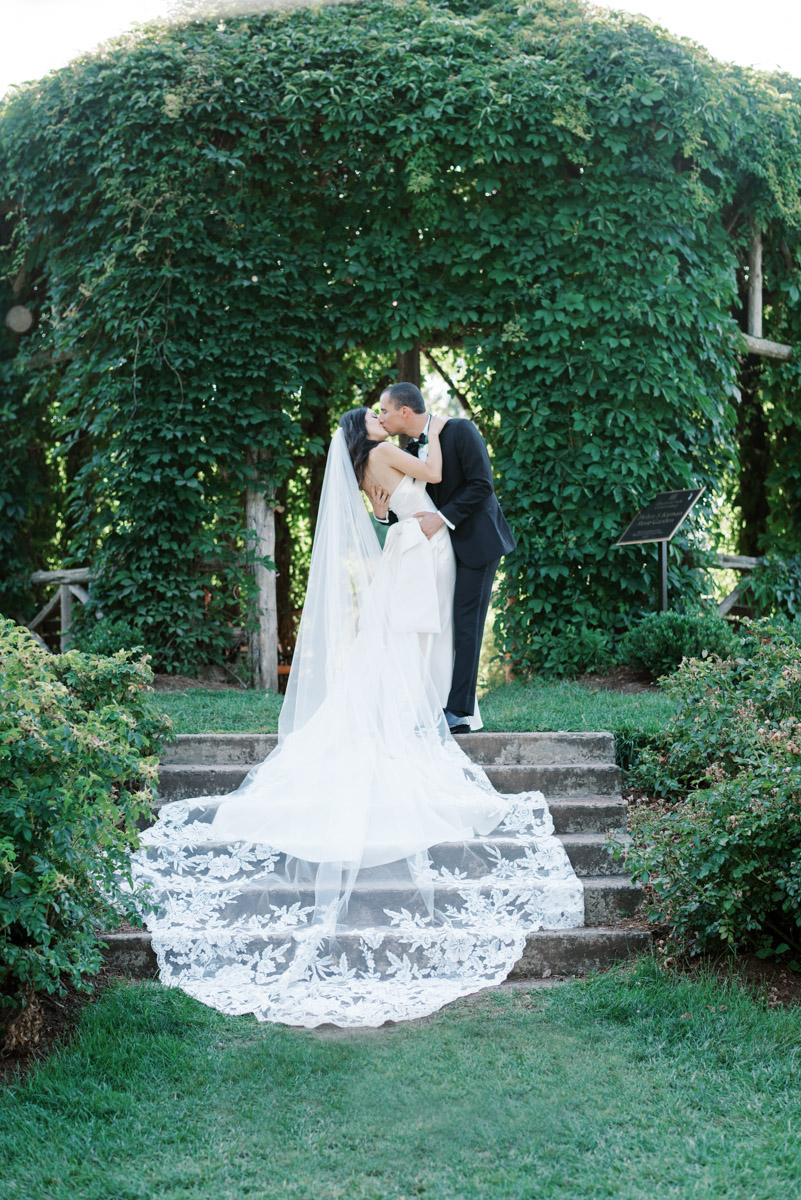 bride and groom long dress shot