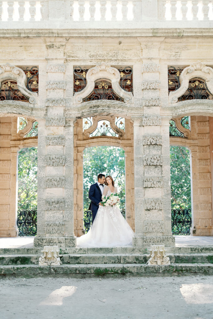 Bride and groom together at Vizcaya museum.