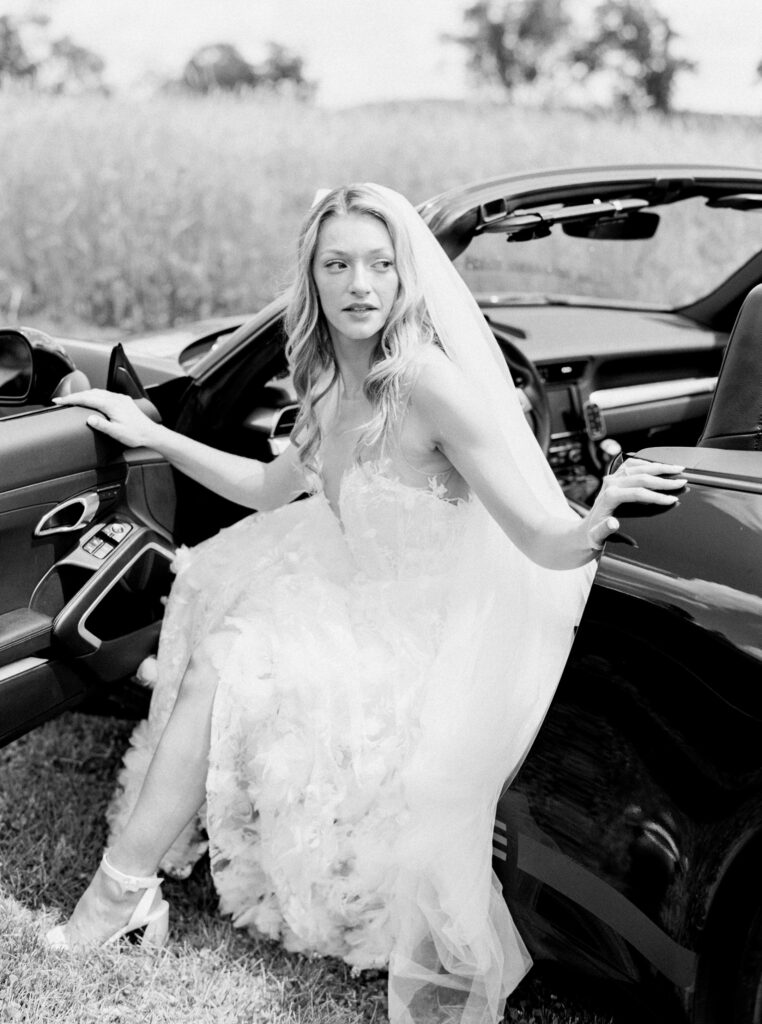 bride portrait getting out of the car