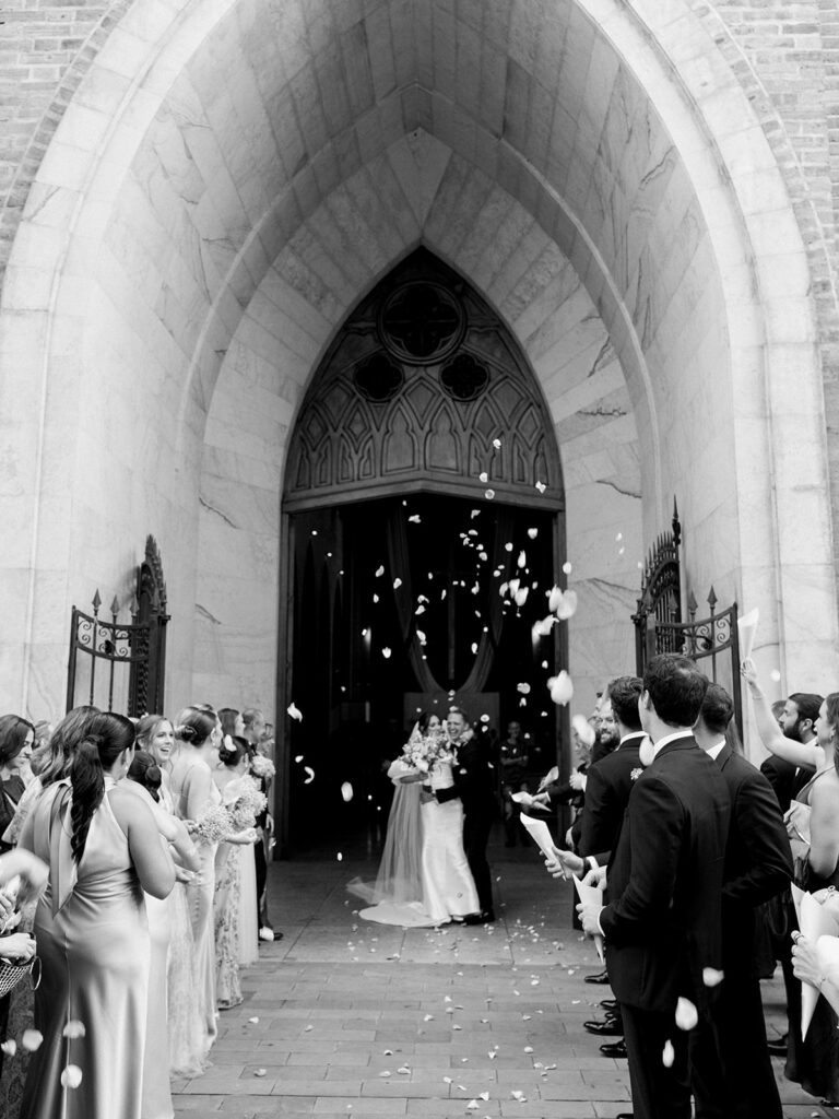 Bride and groom exit the church during one of the 5 Wedding Photos You Need to Take.