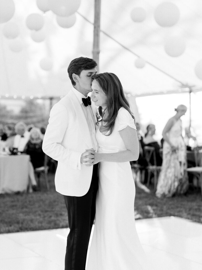Sharing a laugh during their first dance captured by CT Wedding Photographer, Jennifer Conti.