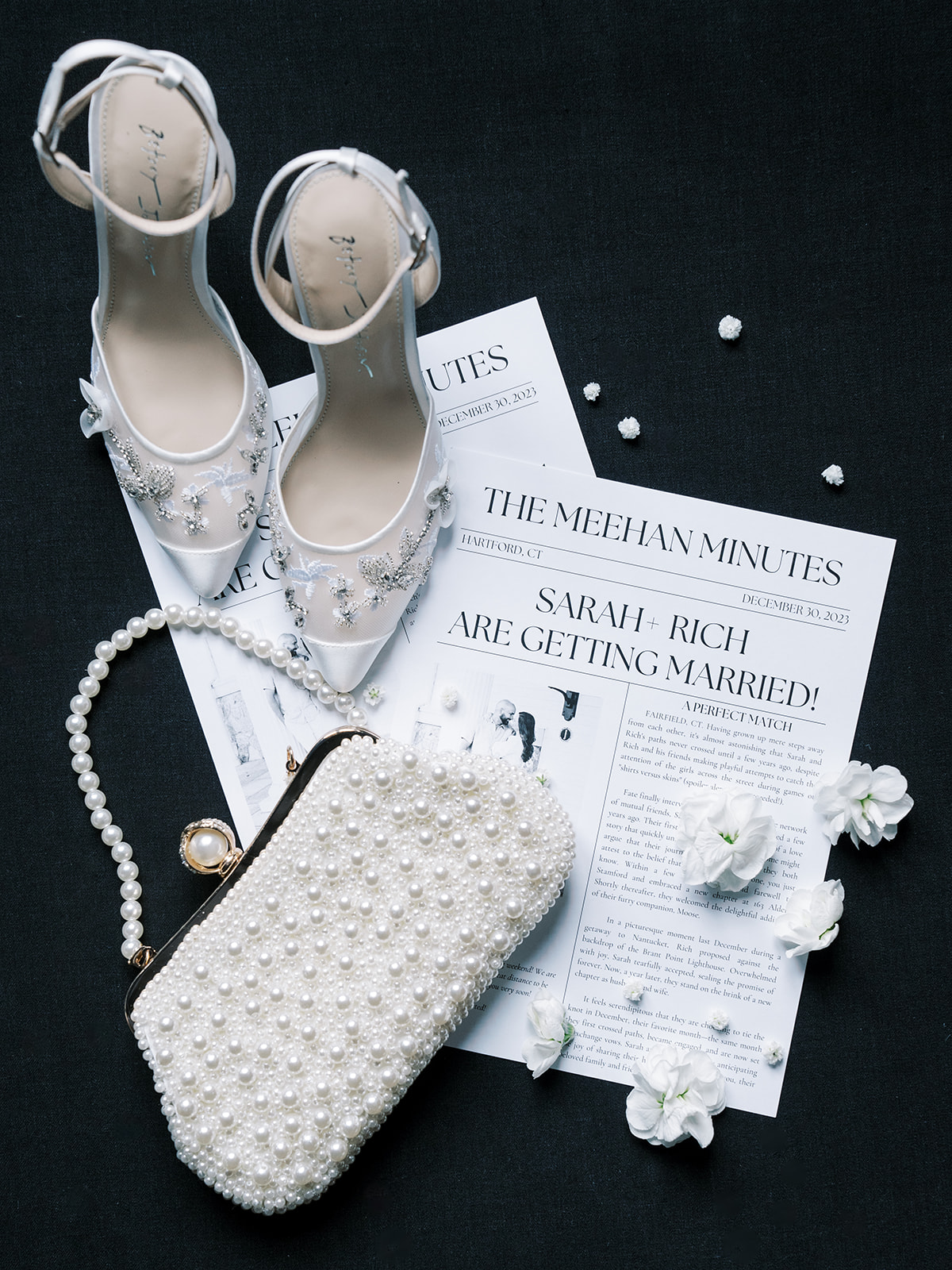 A deconstructed flatlay showing the wedding detail trend of 2024.