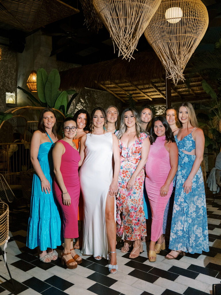 A formal photograph of the bride and her bridesmaids.