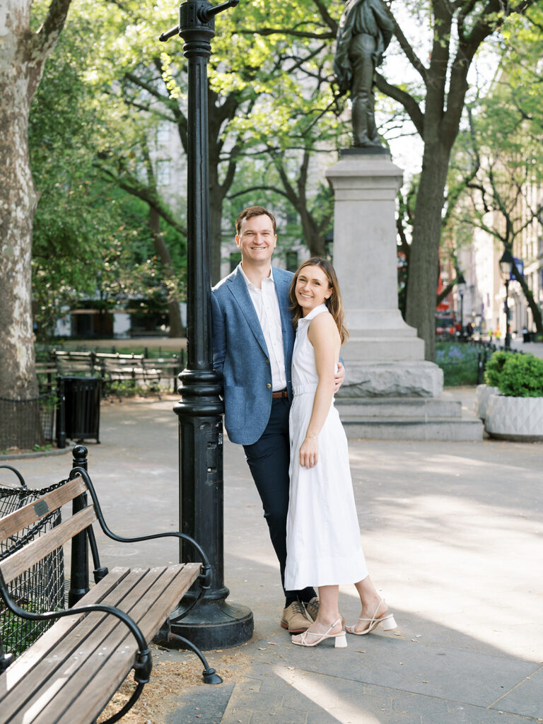 Bride and groom smiling for a classic portrait during their Greenwich Village Engagement Session