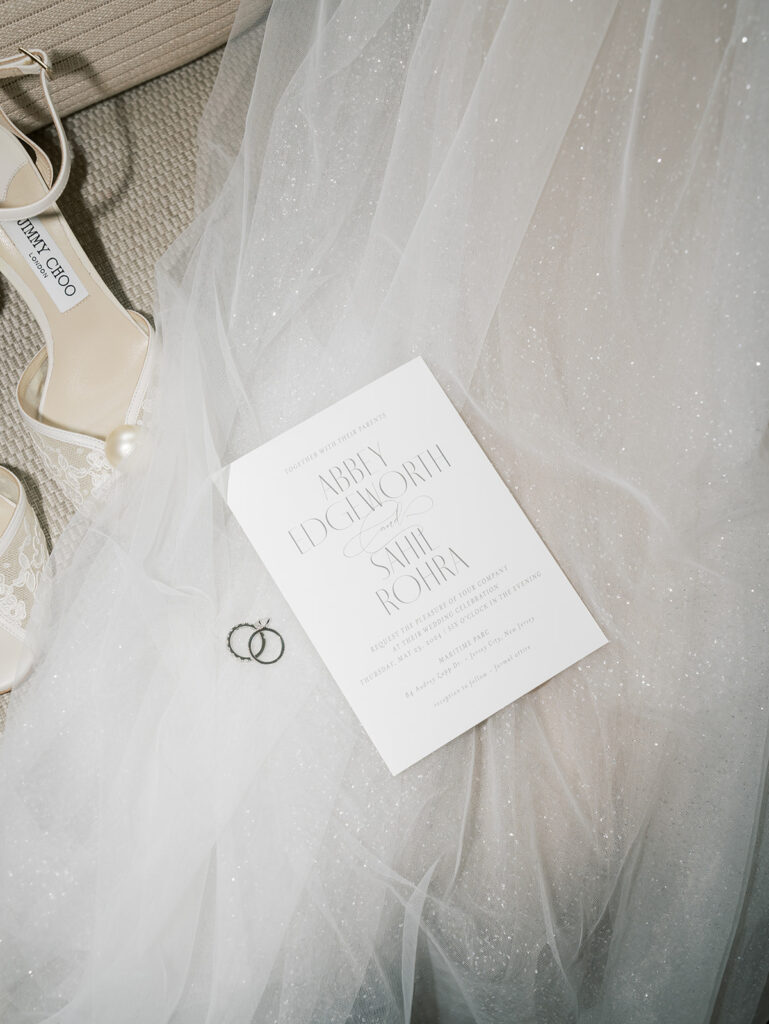 Close up of the invitation on the bride's veil for a styled portrait of the details.