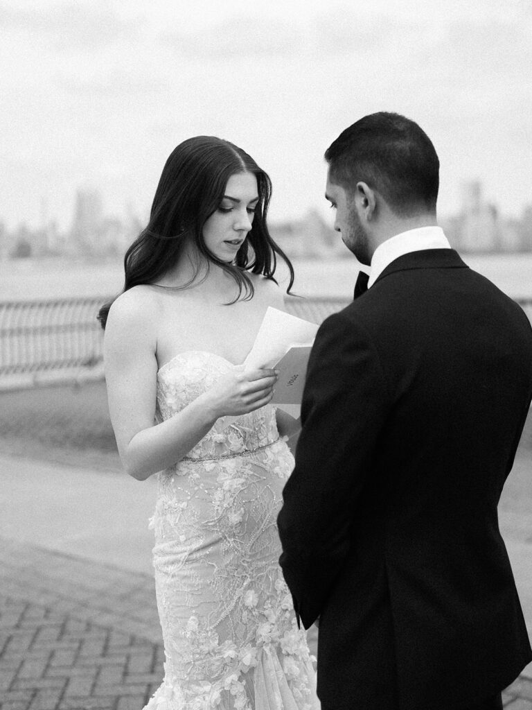 The bride and groom sharing vows after their first look.