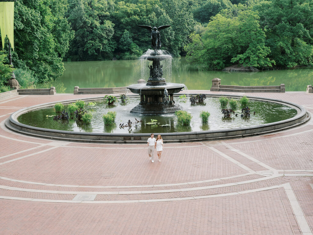 the couple walking together in Central Park