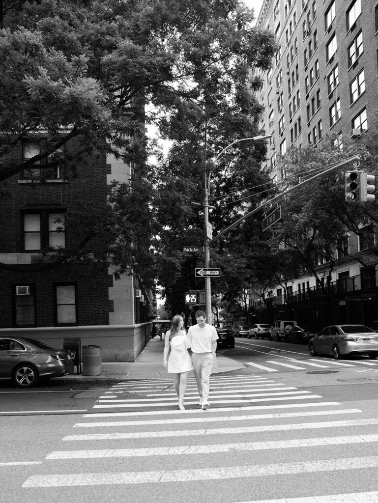 crossing the street in the upper east side engagement shoot