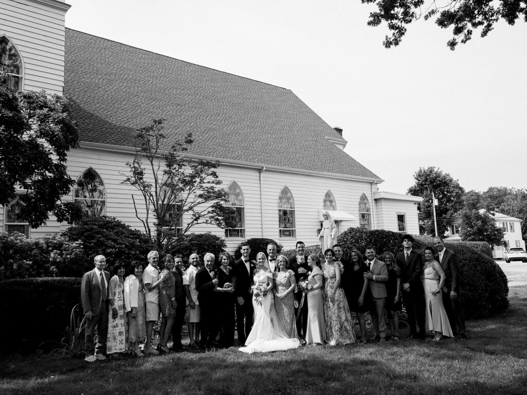 Family posing for a big group picture