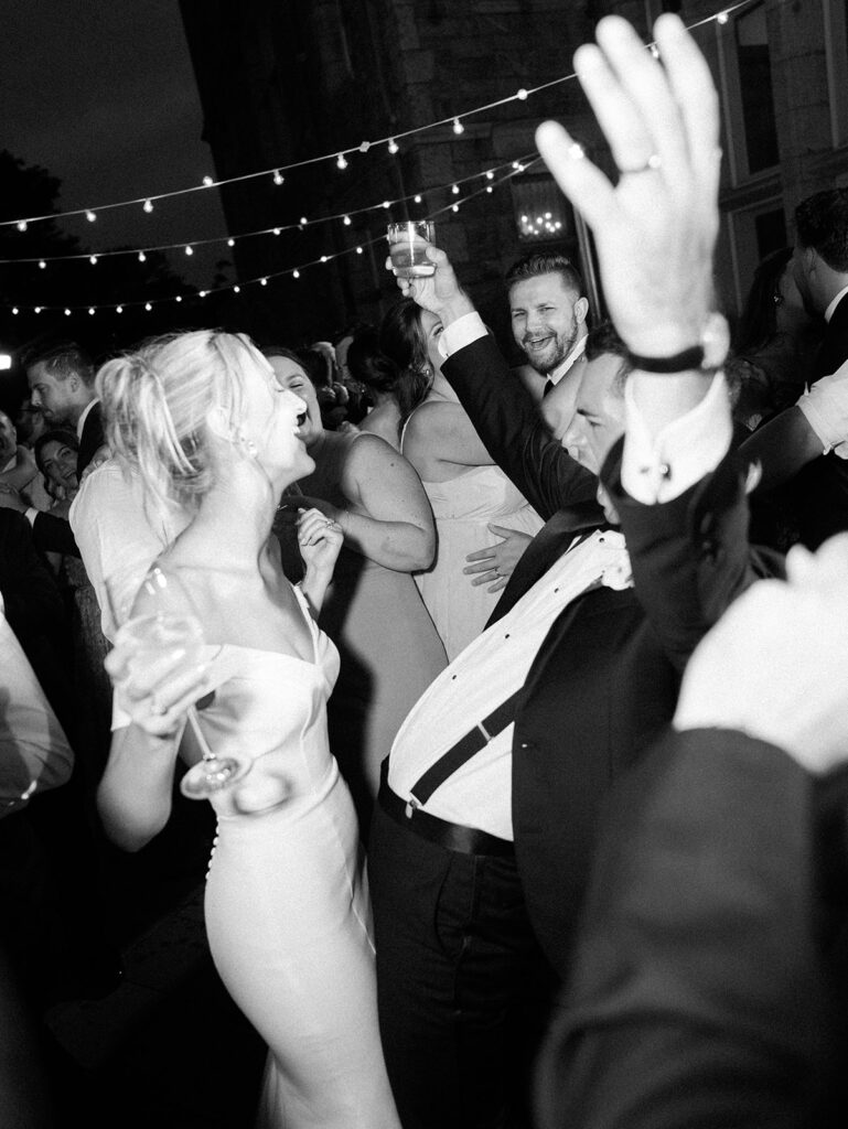 The groom singing to the bride on the dance floor