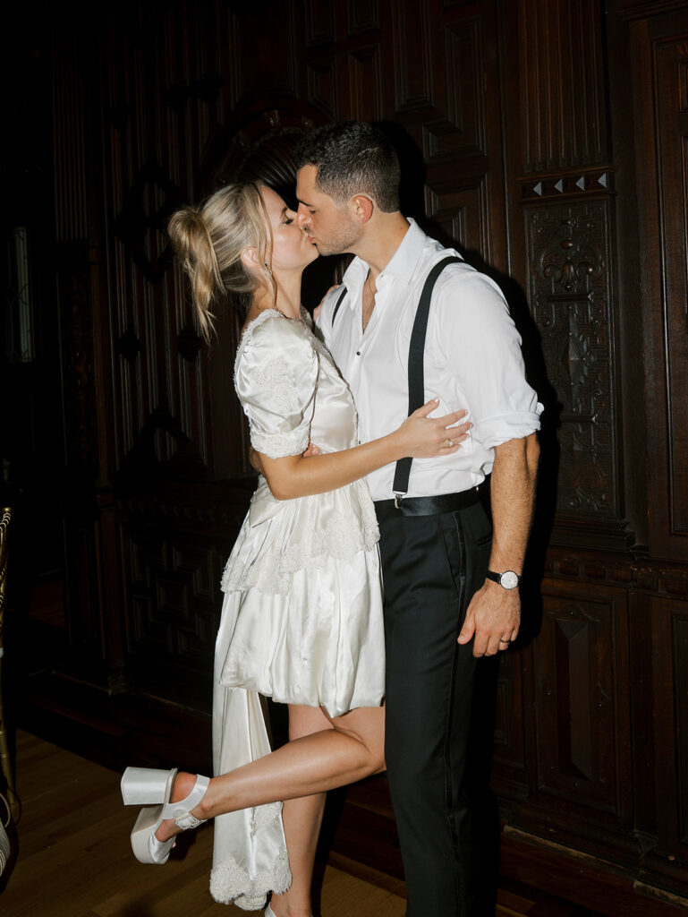 Bride and groom kissing in the second look