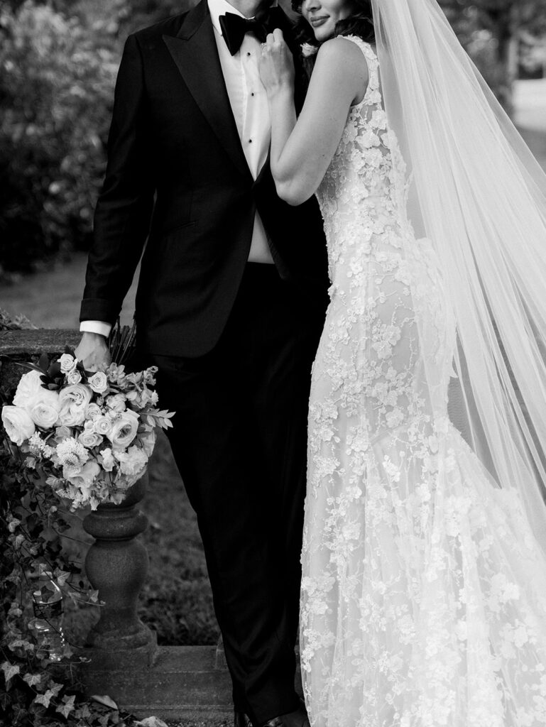 Close up portrait of the bride and groom embracing.