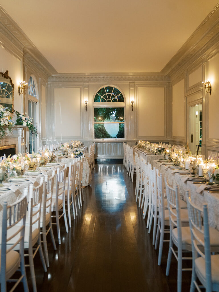 The room set for dinner, pulled back shot of the tables at Eolia Mansion.