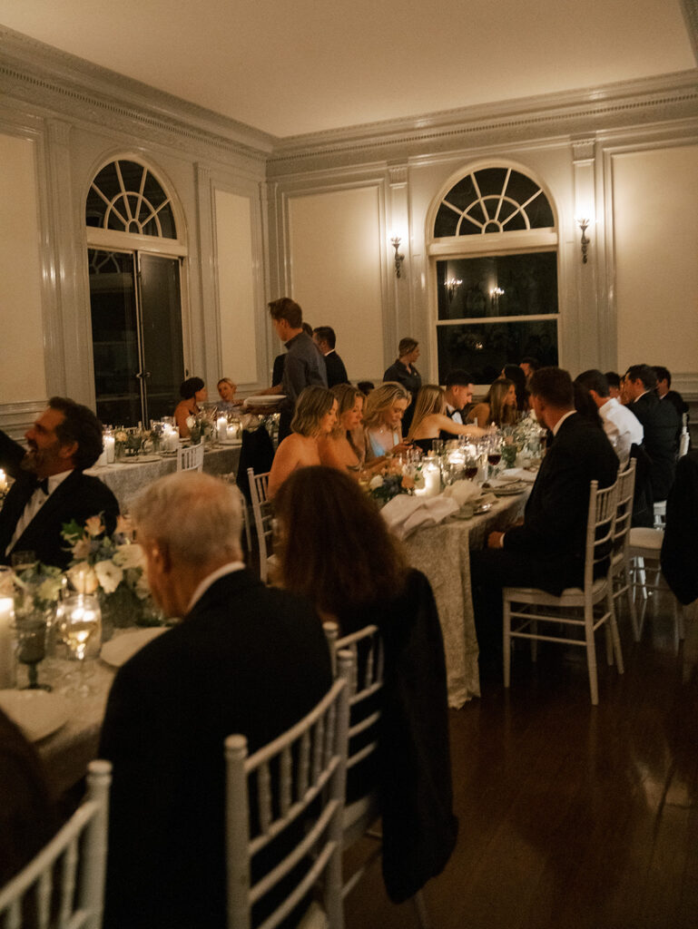 Dinner ambiance while guests eat in the dining room at Eolia Mansion