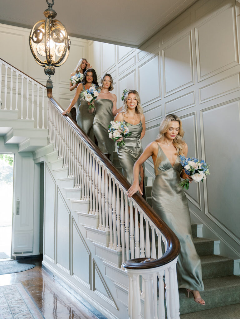 Bridesmaids coming down the stairs at Katie's Eolia Mansion wedding