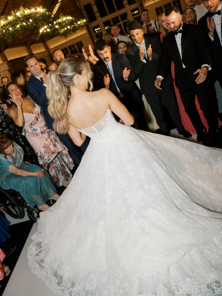 The bride spinning on the dance floor.