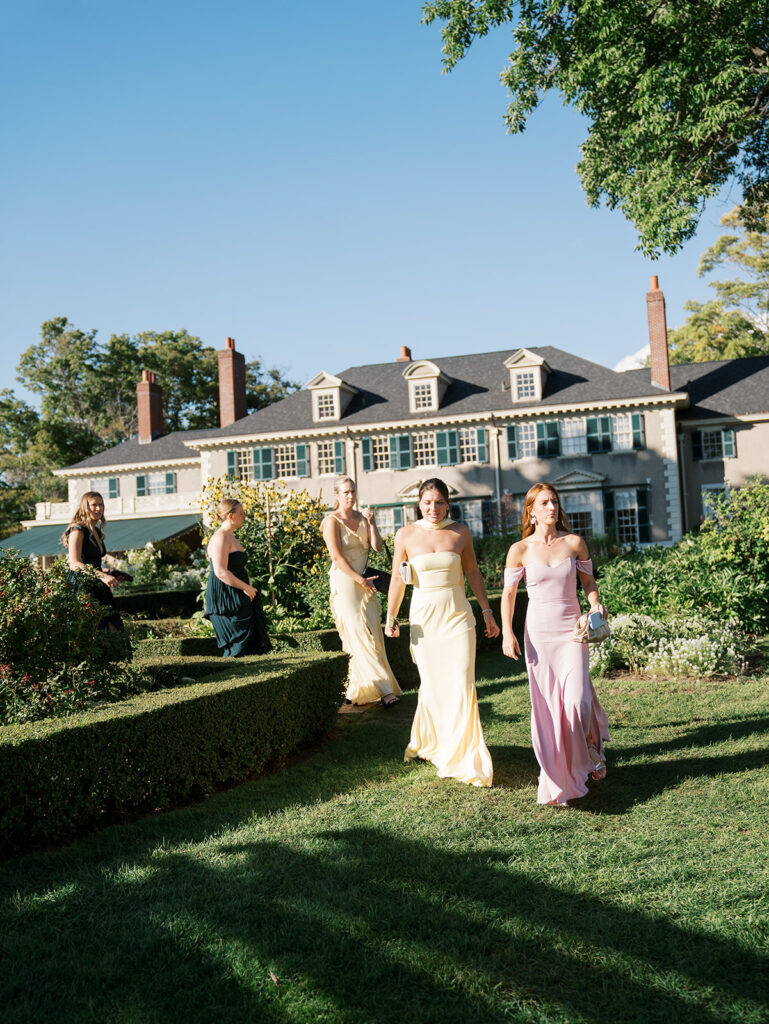 Guests walking toward cocktail hour in a line at the Hildene Wedding.