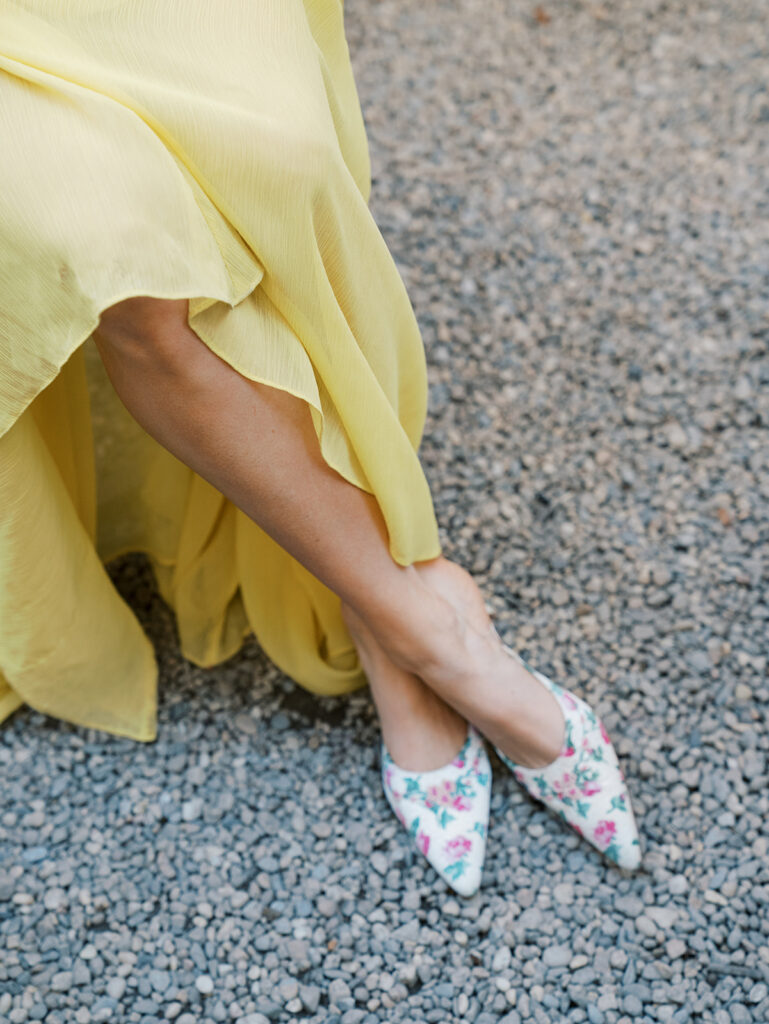 A close up of the bride's floral shoes.