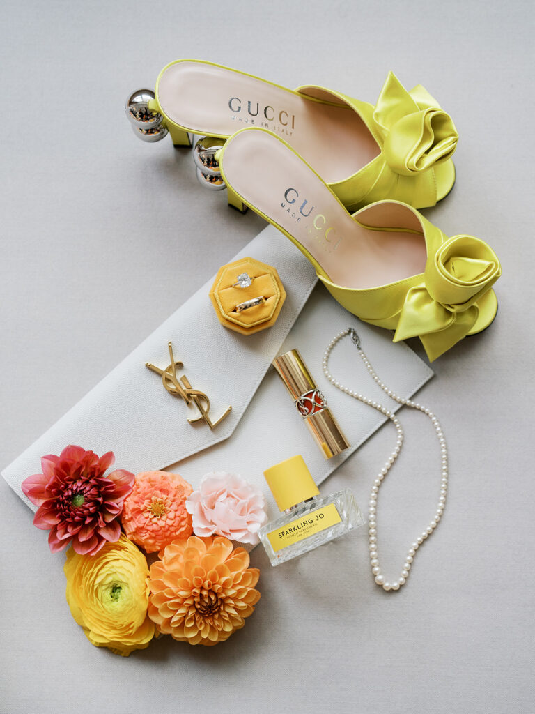 A flat lay of the brides details.