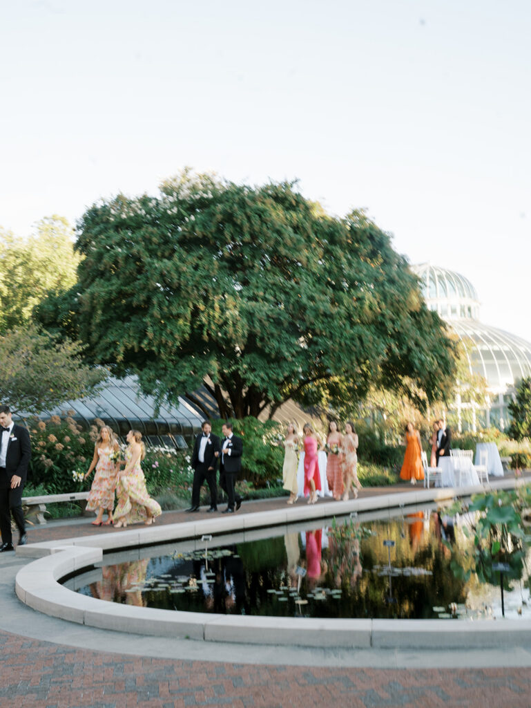 Wedding party arriving for portraits shot at a distance at Brooklyn Botanic Wedding