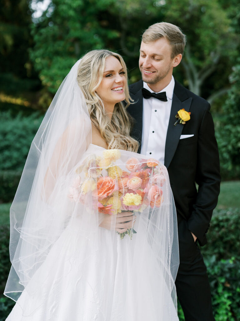 Bride and groom in a candid portrait at Brooklyn Botanic Wedding