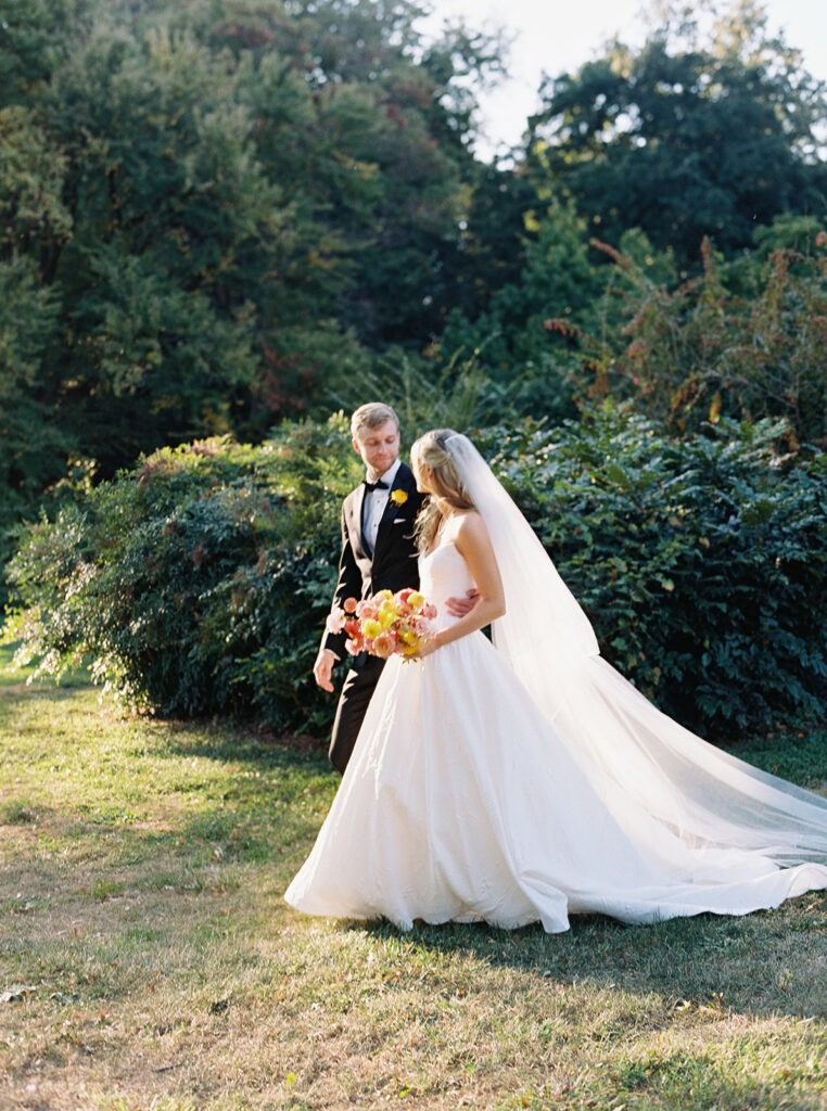 Bride and groom in the glow of the sunlight.