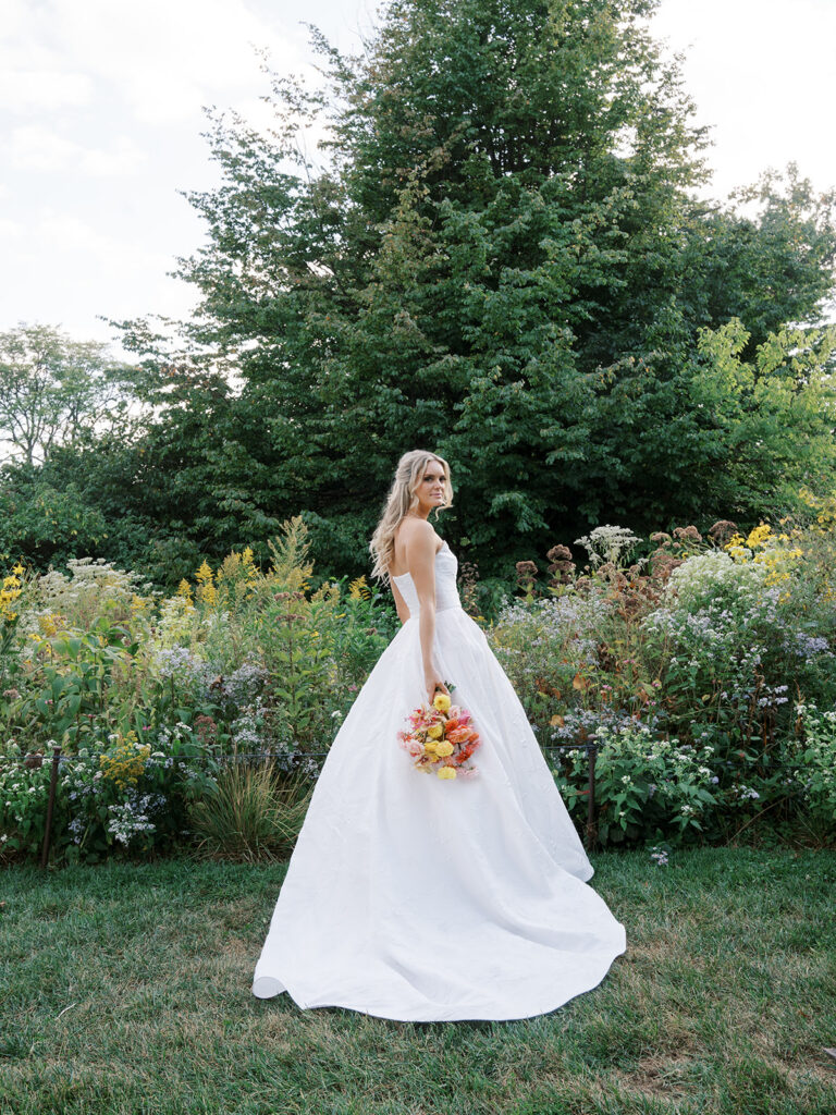 Portrait of the bride in the gardens at her Brooklyn Botanic Wedding.