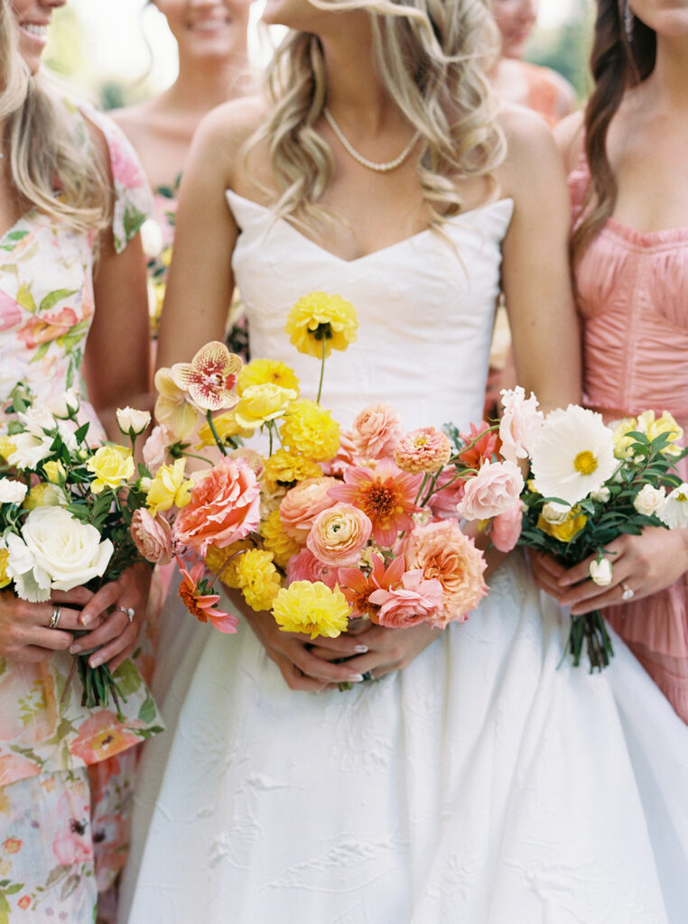 Close up floral detail of the bride and her bridesmaids.