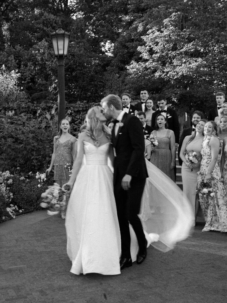 Bride and groom kissing.