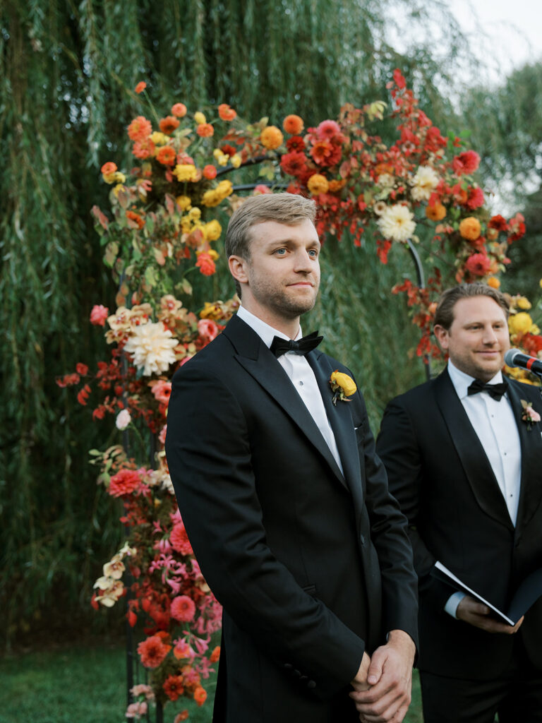 The groom waiting for his bride to come down the aisle.