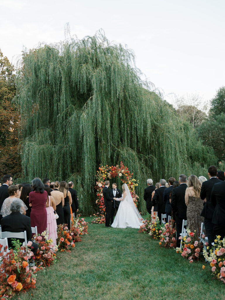 Pulled back view of the ceremony during their Brooklyn Botanic Wedding.