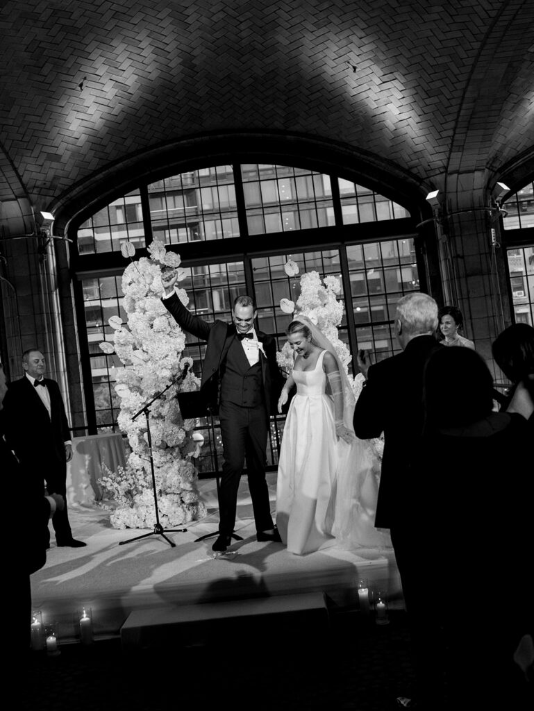 The bride and groom breaking the glass at their Guastavino's wedding ceremony.