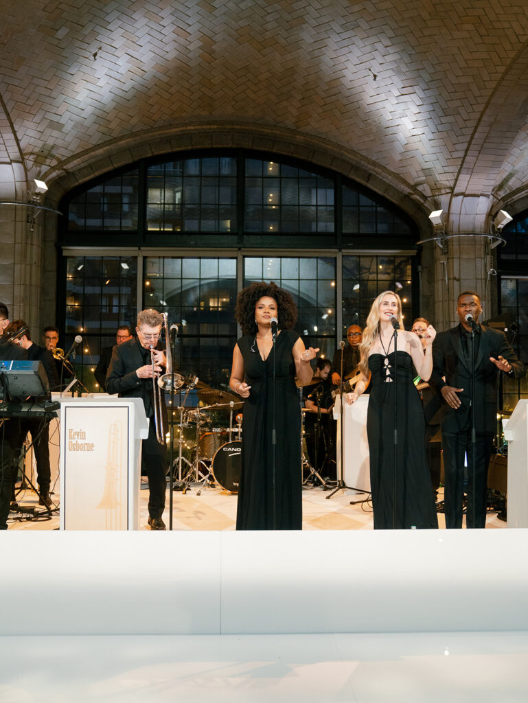 A photograph of the band warming up for reception.