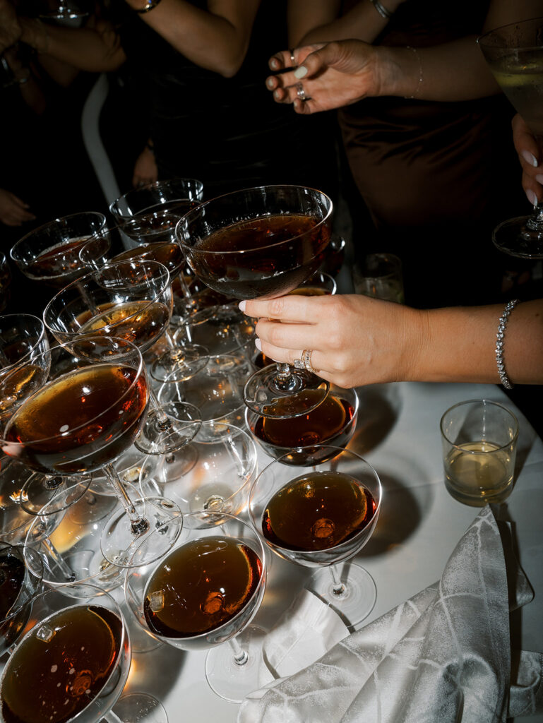 A guest reaching for an espresso martini.