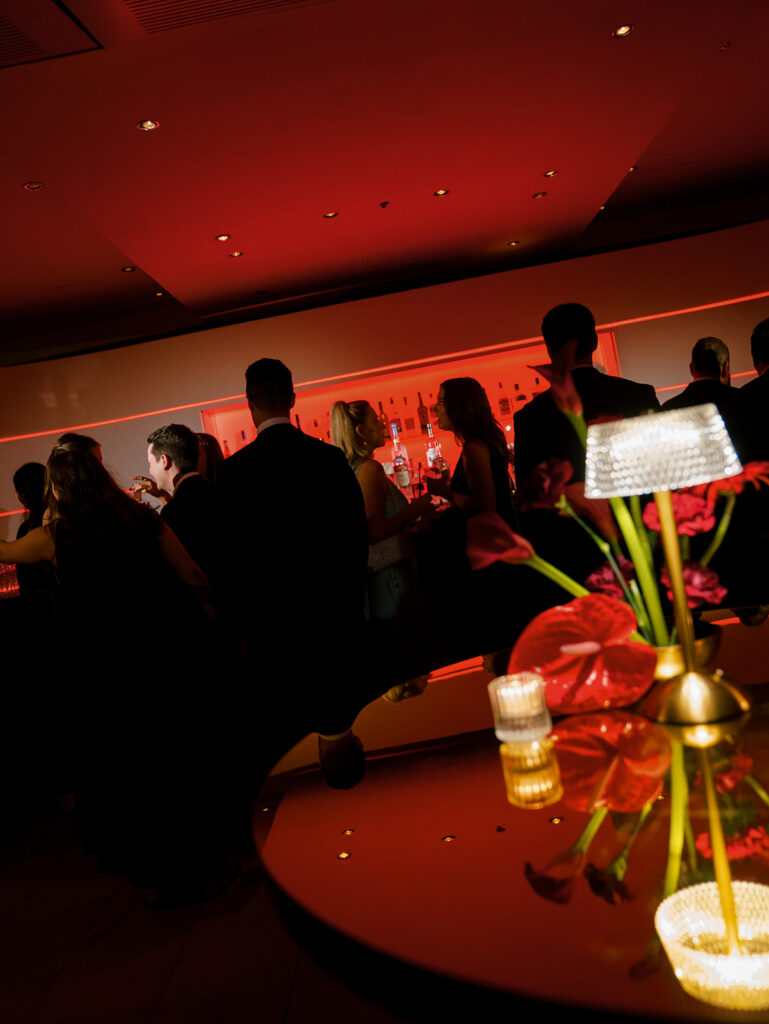 A silhouette of guests enjoying the after party at this Guastavino's wedding.