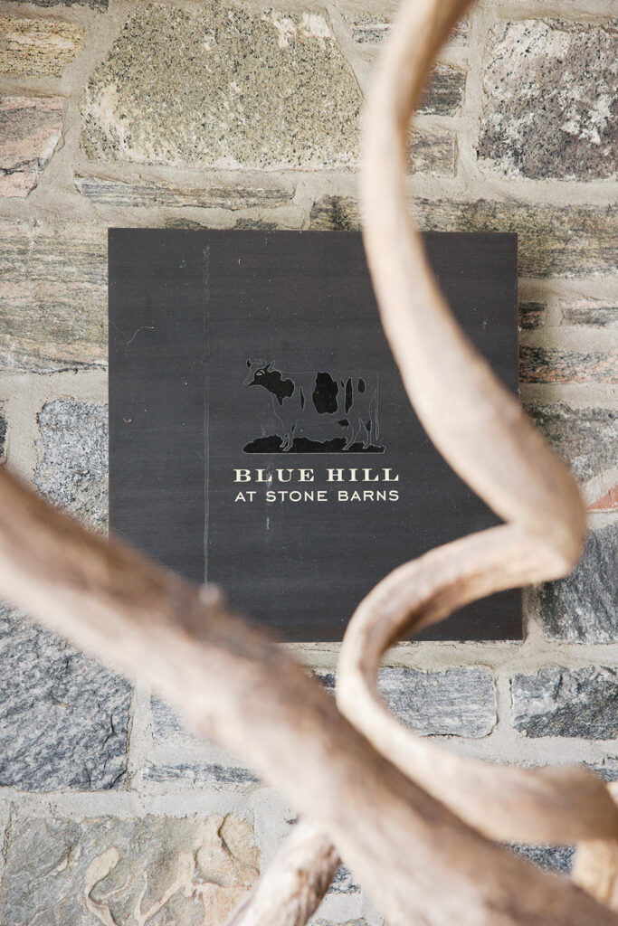 A photo of the plaque of Blue Hill at Stone Barns wedding.